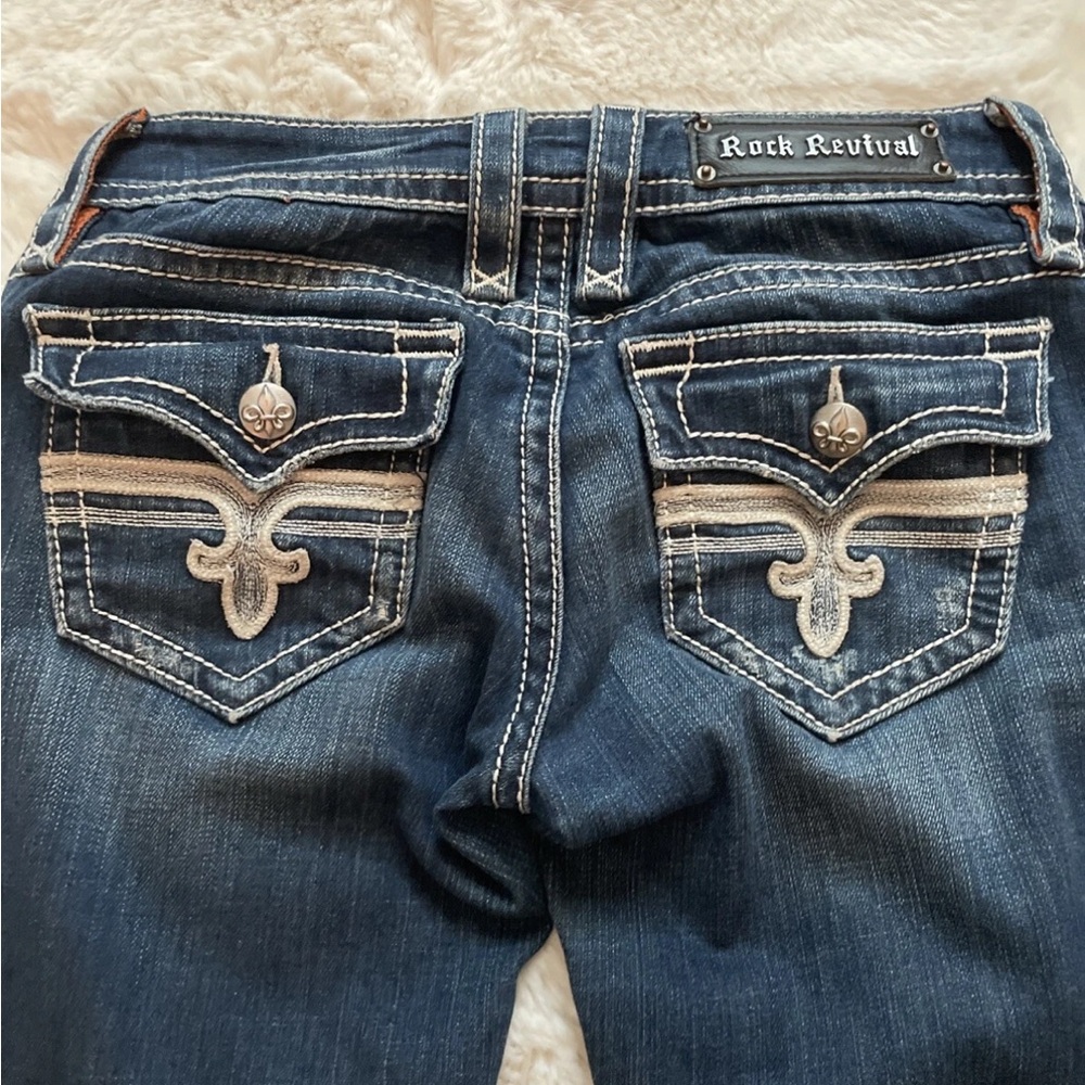 Rock Revival Women's LOW RISE Dark washed boot cut jean size 27